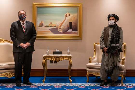 Former Secretary of State Michael Pompeo and a member of the Taliban negotiating team in Doha, Qatar. (State photo)