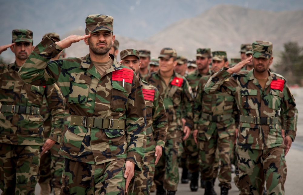 Afghan National Army (ANA) cadets practice drill at the Afghan National Defense University for future officers. Soldiers are wearing woodland pattern uniform.
