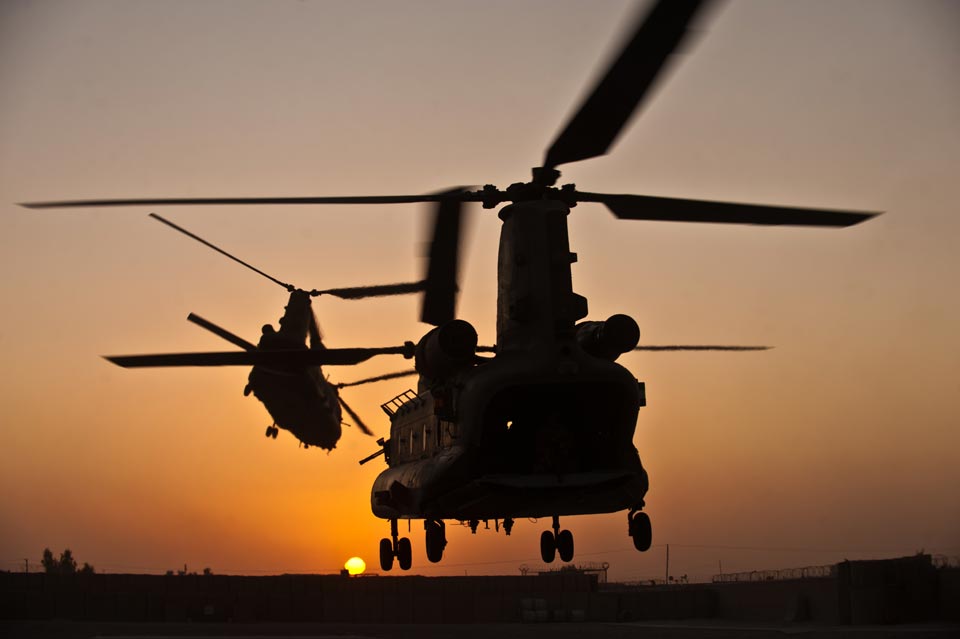Two Royal air force CH-47 Chinooks take off from Task Force Helmand headquarters in Lashkar Gah district, Helmand province, Sept. 22. [2011]