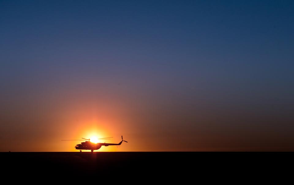 A Mil MI-8 helicopter taxis on the runway at sunrise at Camp Bastion, Helmand province, Oct. 23. The Russian-built MI-8 is in use in over 50 countries around the globe.