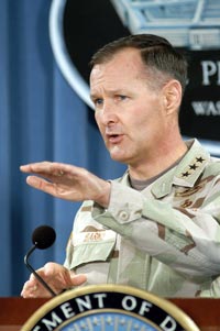 Army Lt. Gen. David W. Barno, who heads Combined Forces Command Afghanistan, briefs reporters Oct. 19 at the Pentagon on operations conducted in support of the recent Afghan elections.