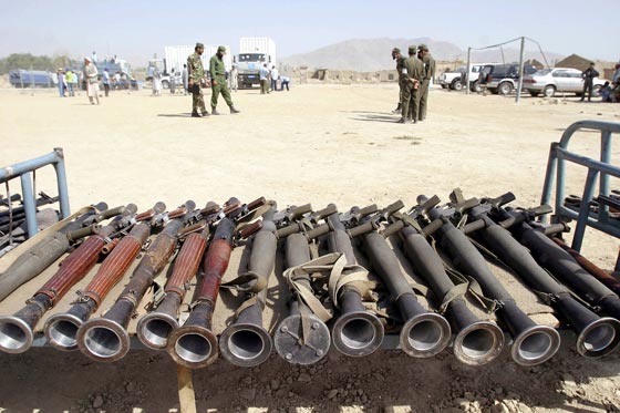 Heavy weapons on display after being handed over by Afghan militiamen as part of the DDR program. (AFP photo)