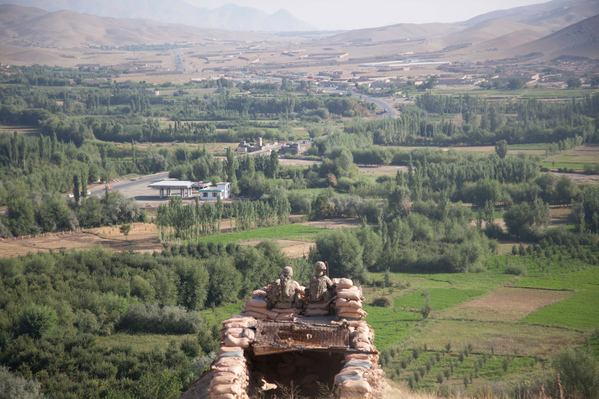 U.S. soldiers with the 1st Battalion, 5th Cavalry Regiment man an observation post overlooking Highway 1 in Wardak province, on Aug. 12, 2013. (U.S. Army photo by 1st Lt. Yau-liong Tsai)